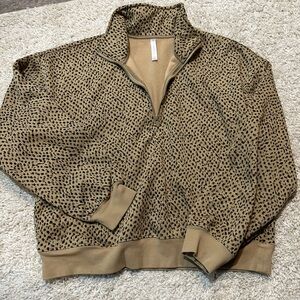 Fabletics Abstract Cheetah / Dark Twill
Cozy Fleece Half Zip Sweatshirt
